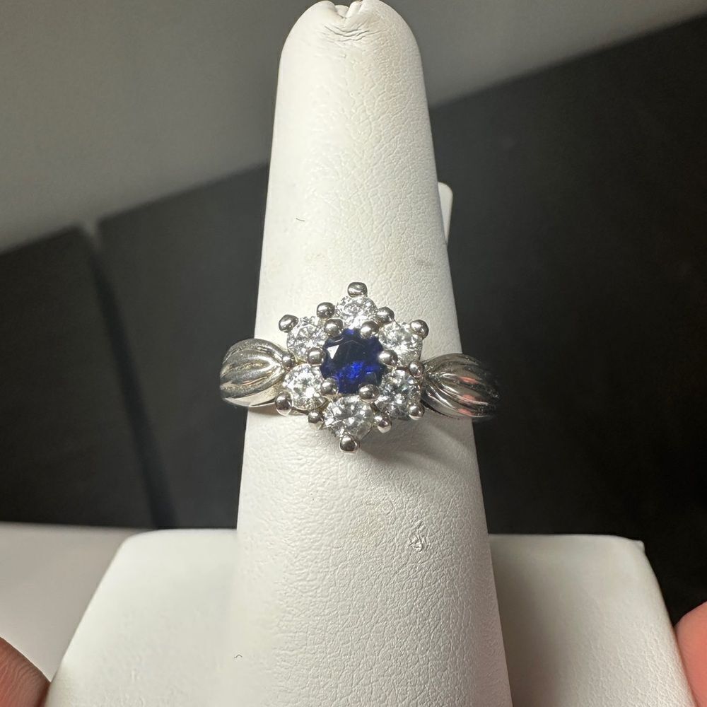 Genuine Blue Sapphire and accent cz diamonds in sterling silver ring!